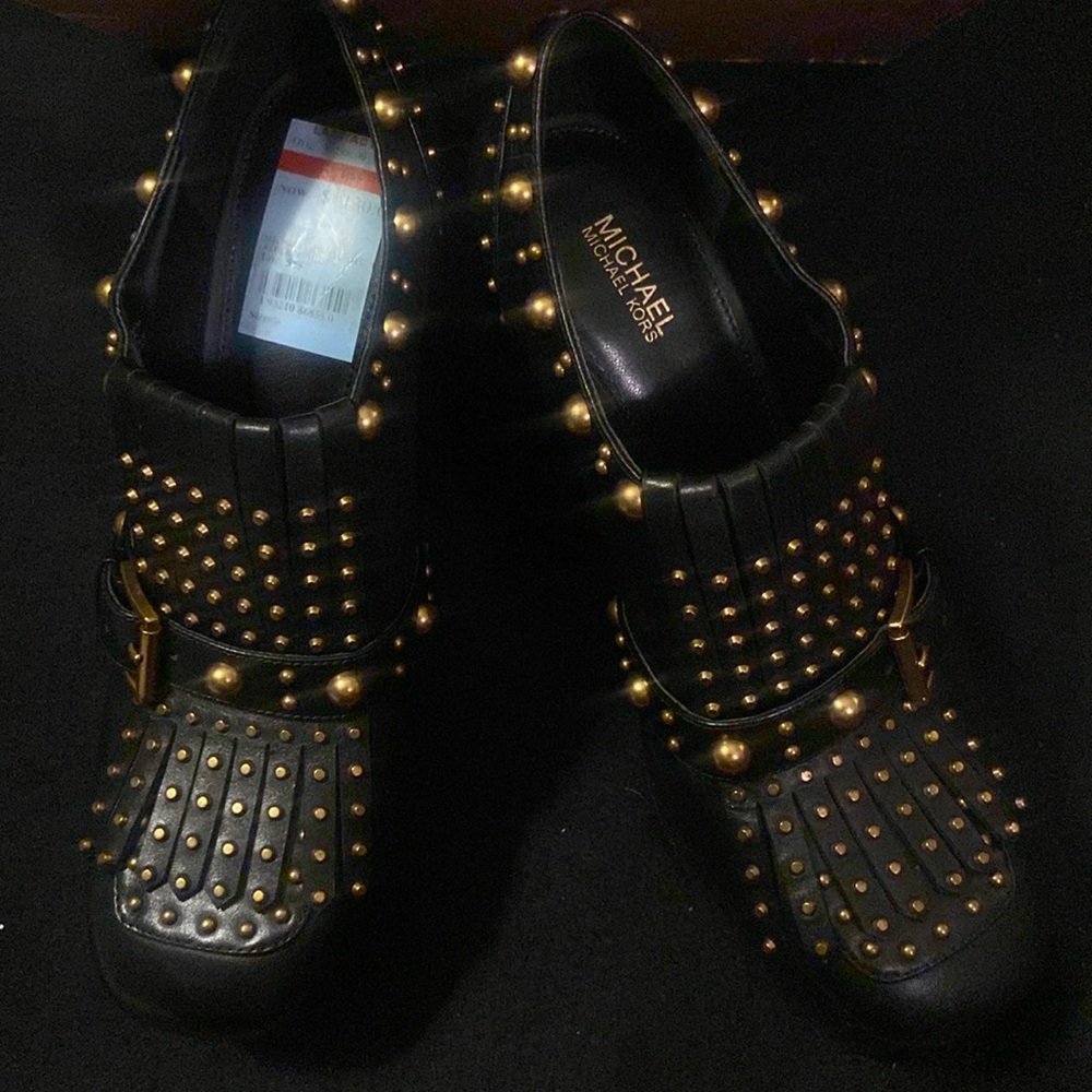Michael kors Alberta mid leather size 8 women’s black platform shoes.